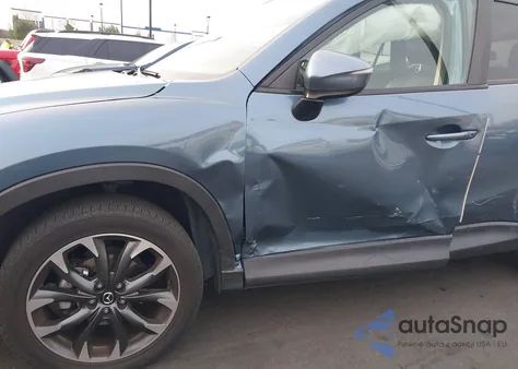 2016 Mazda Cx-5 Grand Touring z USA, uszkodzony, nr VIN JM3KE2DY9G0889436